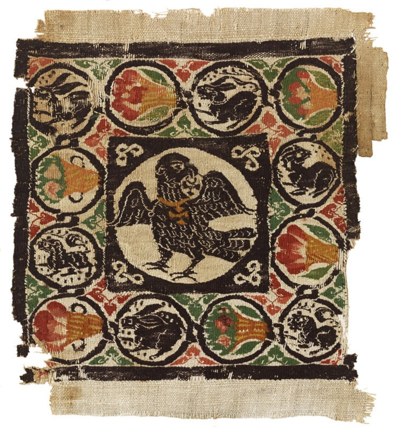 Carré de tapisserie à décor d'aigle, Égypte, entre 5e et 6e siècles  MT 24419. Achat auprès de M. Tano, 1886 © © Lyon, musée des Tissus et des Arts décoratifs — Pierre Verrier